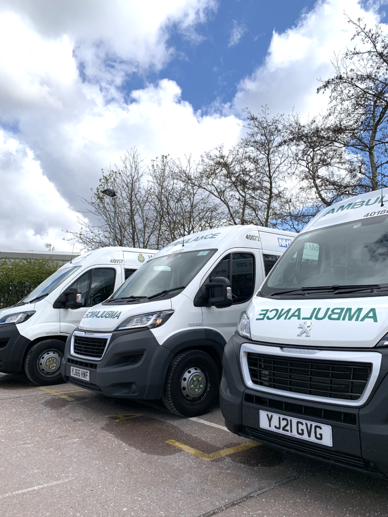 Non-emergency ambulances parked up at base