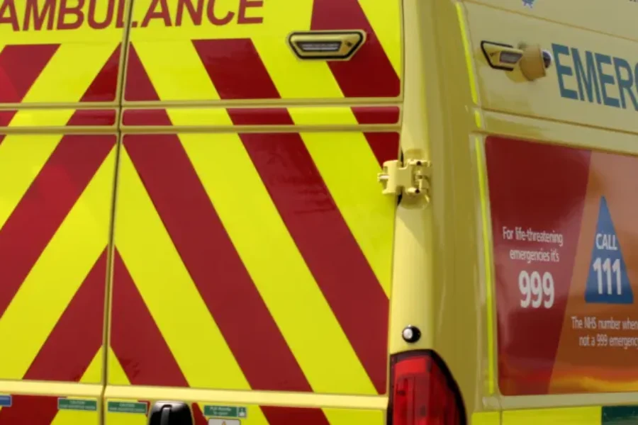 a semi-close up image showing the back of an ambulance on an angle