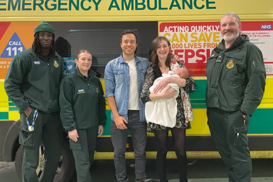 Paramedics with new parents Phoebe and Antony and baby Lenny