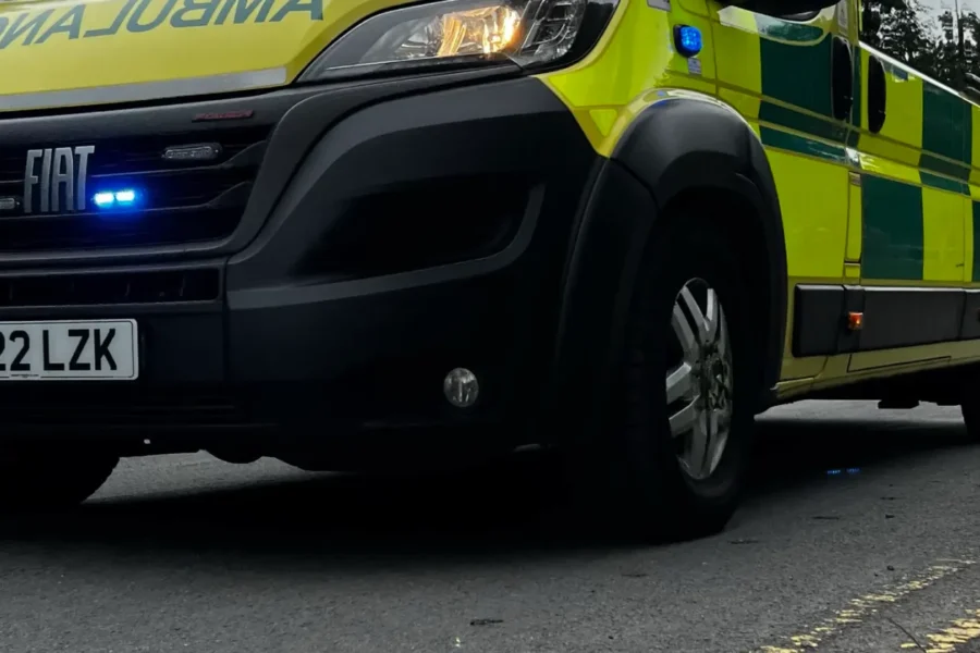 bottom half shot of an ambulance on a road